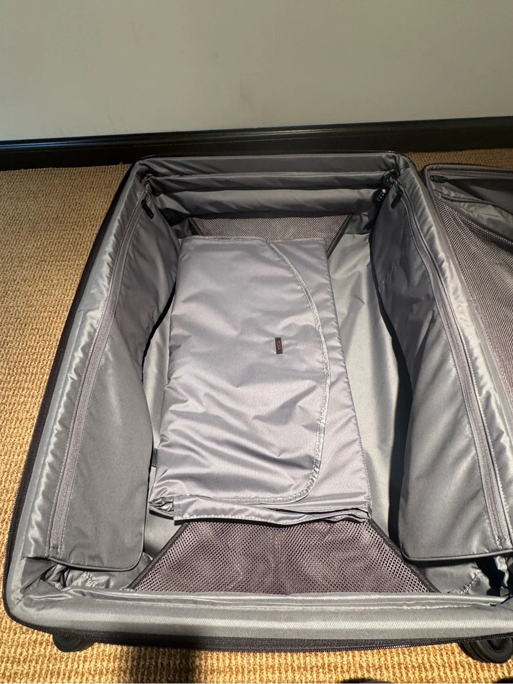 Tumi Black Softside Spinner check luggage with Front Pocket